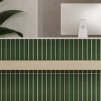 Front desk lobby design with dark green ceramic subway tiles