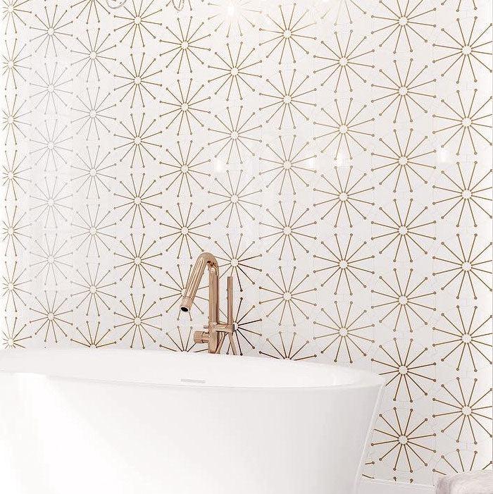 White and gold bathroom with marble and brass inlay vintage decorative tiles