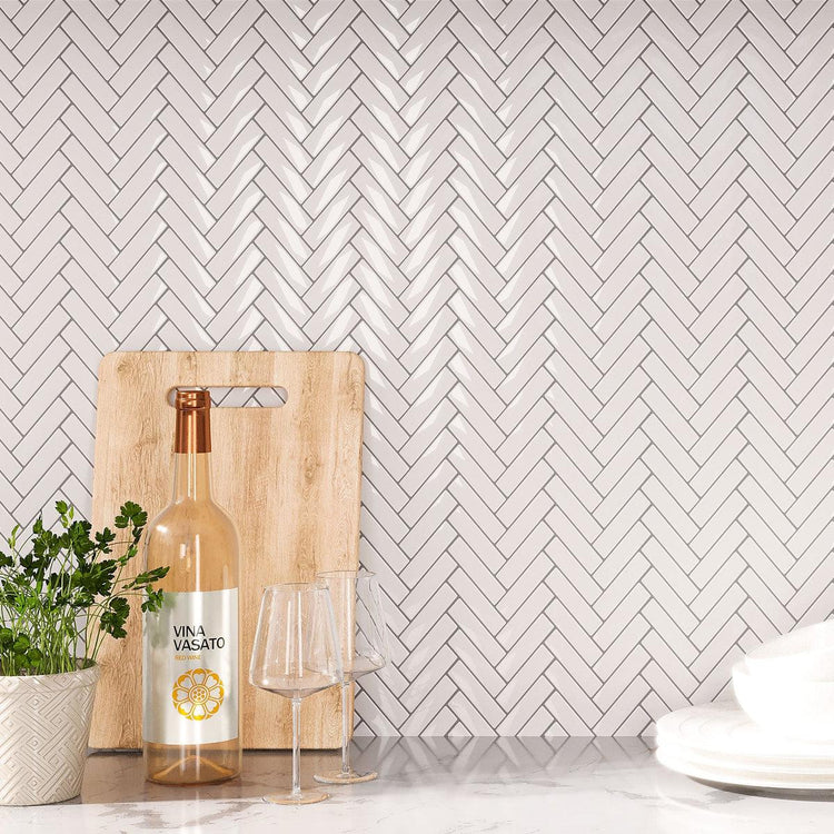 Glossy white peel & stick tile herringbone backsplash
