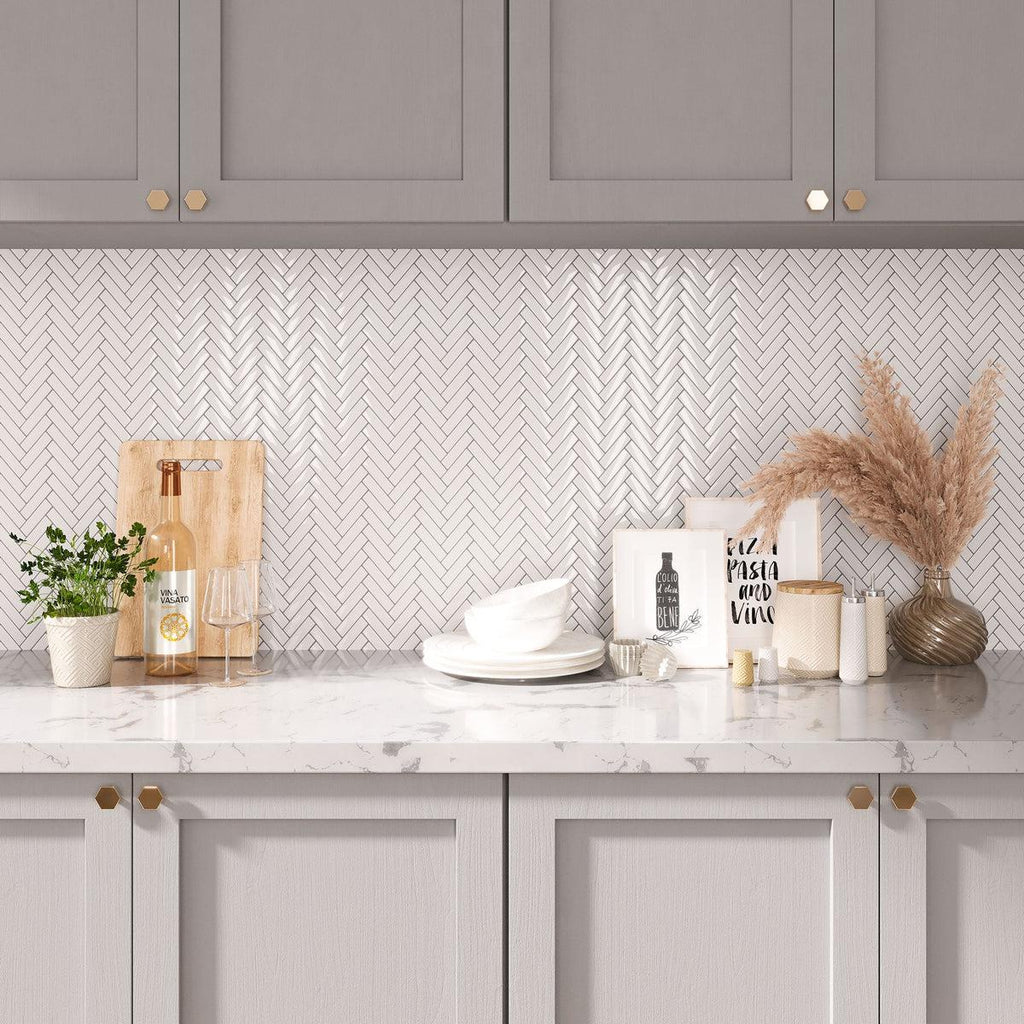 Modern neutral kitchen with white herringbone peel and stick tile backsplash