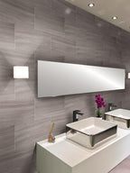 Large format marble tiles in wooden beige 