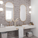 Textured bathroom wall tile with etched marble subway tiles